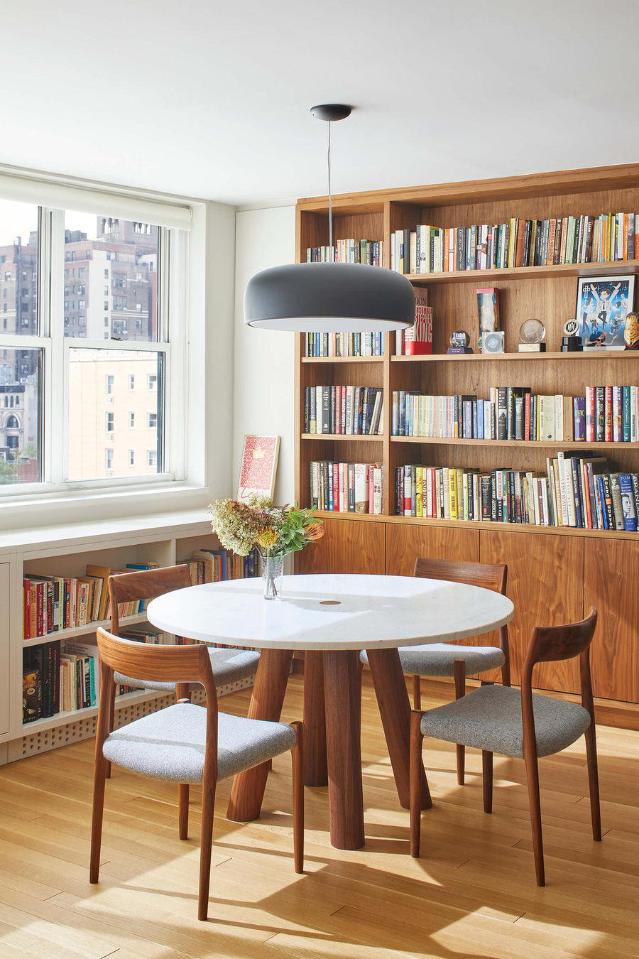 Round Stone Top Angled Leg Column Dining Table